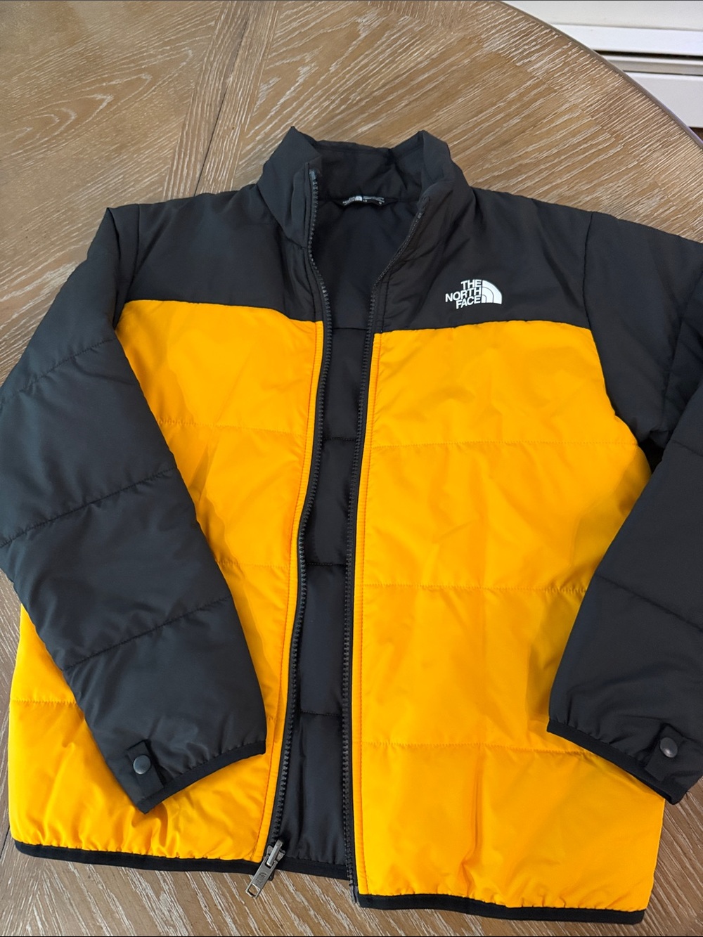 The North Face Kids Yellow and Black Puffer Jacket